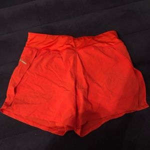 Reddish pink workout shorts